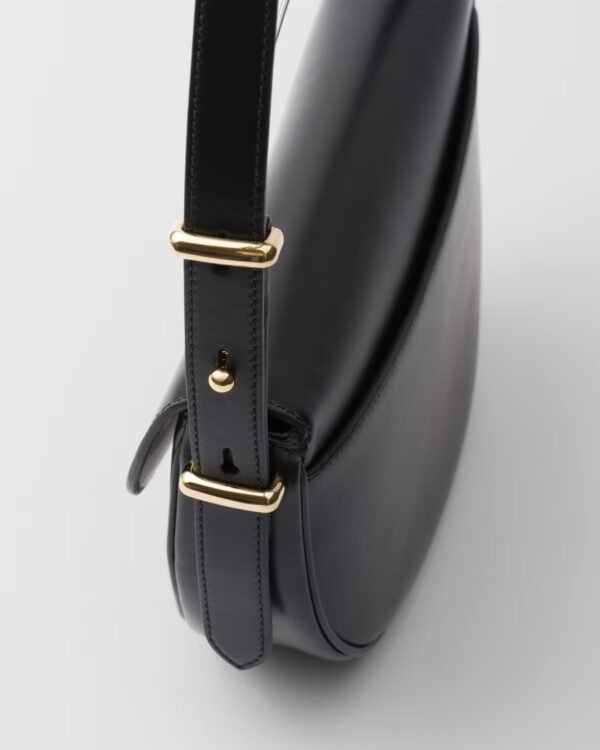 Prada Arqué flip leather shoulder bag
